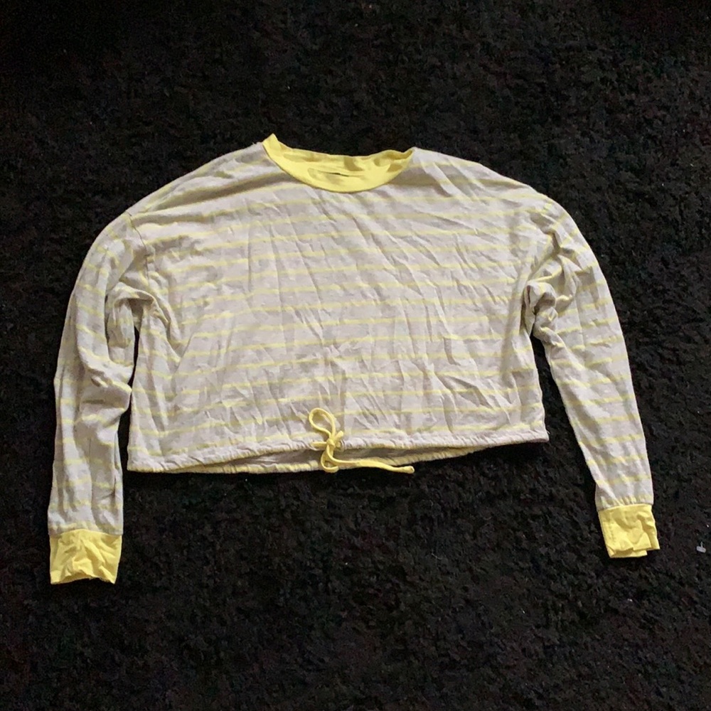 Yellow crop top.